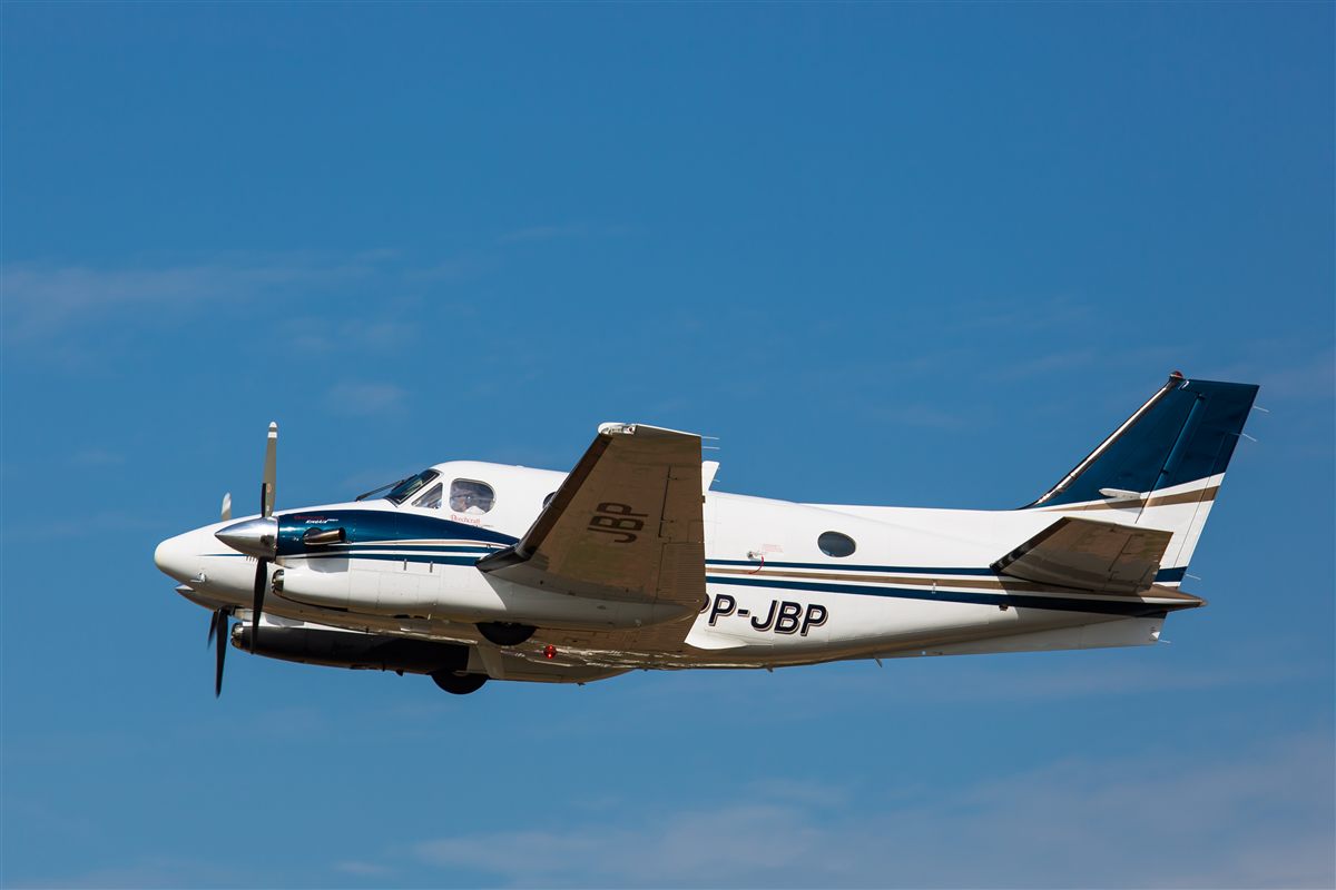 Beechcraft King Air 90 climbing after takeoff