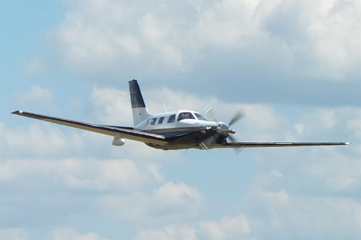Piper Malibu Mirage in flight