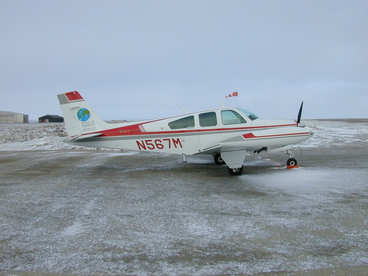 Beechcraft Bonanza on a snowy ramp